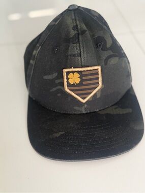 Rawlings Black Camo Cap with Gold Clover Shield Patch